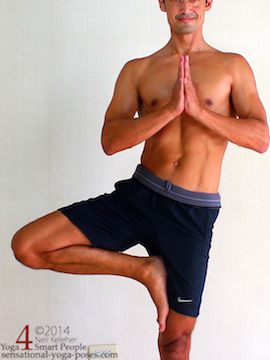 Yoga tree pose with the lifted leg hip slightly higher than the supporting leg hip. Neil Keleher, sensationaly yoga poses.