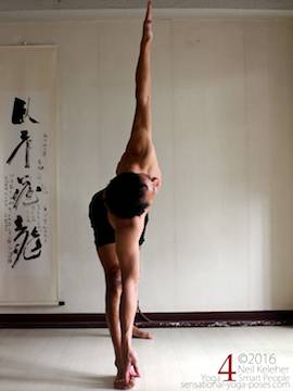utthita trikonasana (triangle pose), grabbing big toe with torso over the leg, Neil Keleher, sensational yoga poses