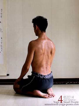 yoga kneeling posture with torso upright and spine slightly extended/bent backwards.