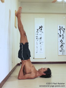shoulderstand with weight towards elbows