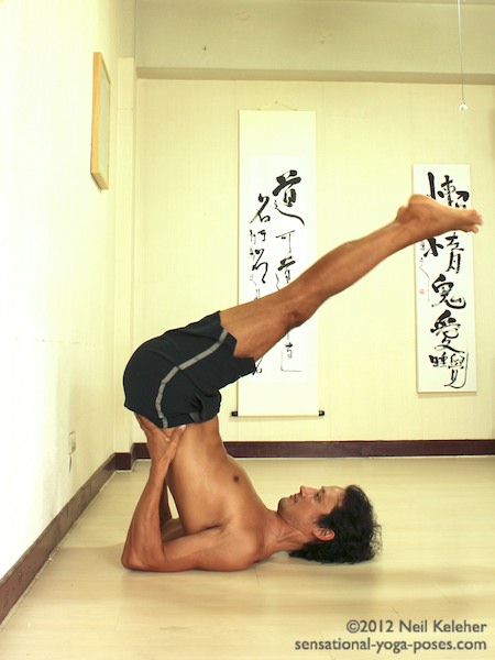 shoulderstand using wall, legs up and back at 45 degrees
